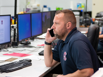 SEOC working at the computer