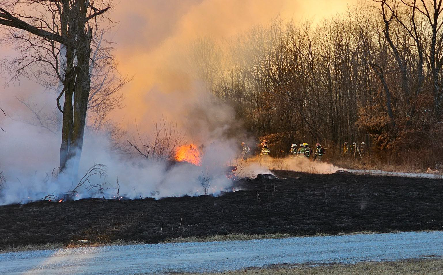fire with smoldering ground